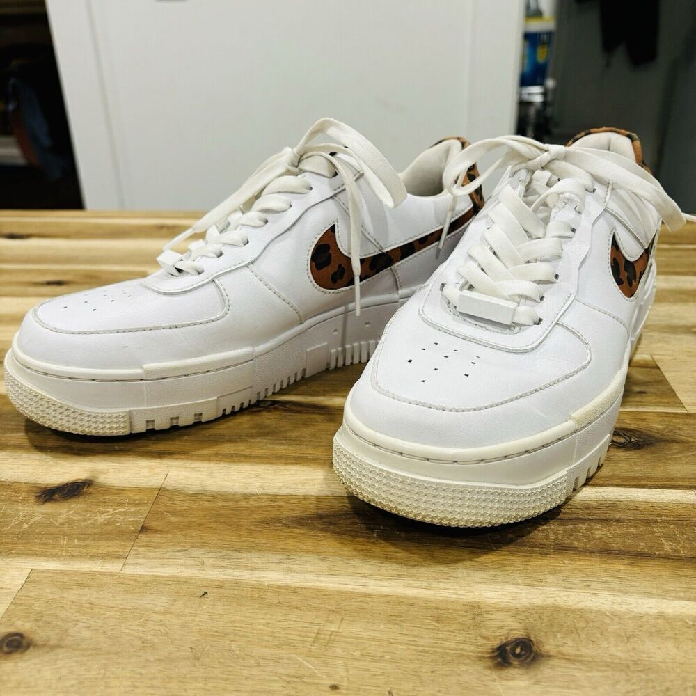 Nike Women's White Athletic Shoes with Leopard Accents